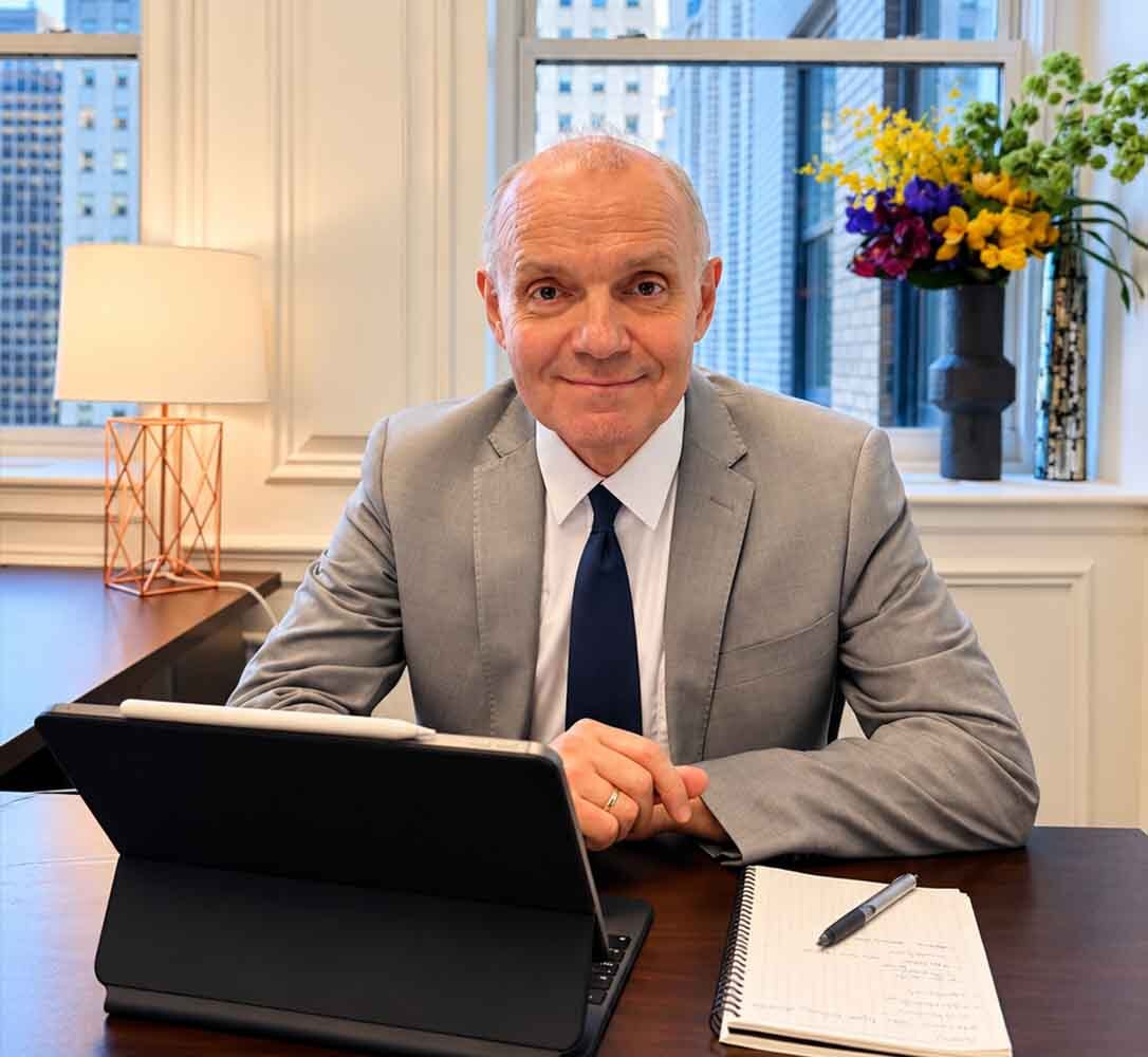 Dr. Zlatin Ivanov, board-certified psychiatrist, at his Midtown Manhattan office offering online psychiatric consultations and medication management.